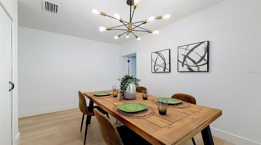 Separate Dining Room With A Statement Chandelier.