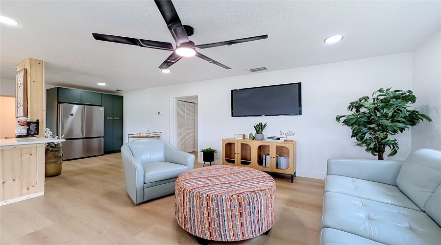 The Living Room Flows Directly Into The Kitchen.