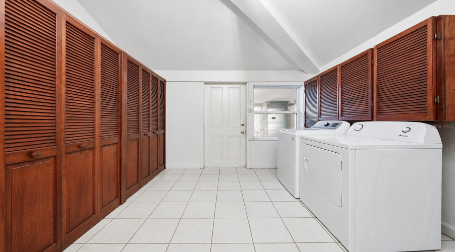 Laundry + Storage And Custom Cabinets