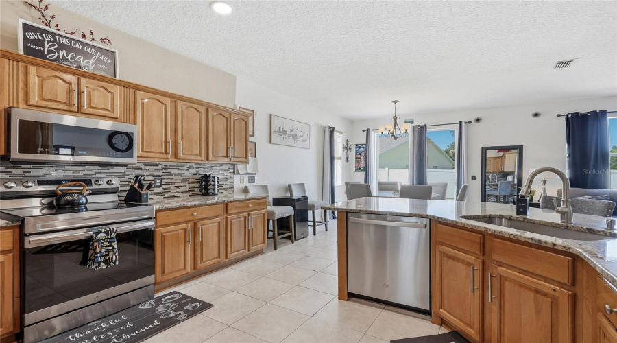 Open Kitchen To Prep A Meal While Visiting With Friends And Family