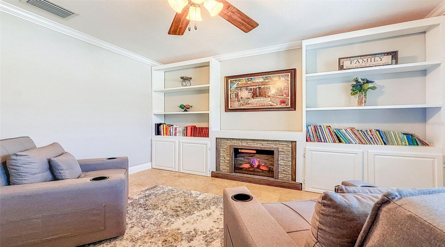 Entry Room With Built-In Bookcases