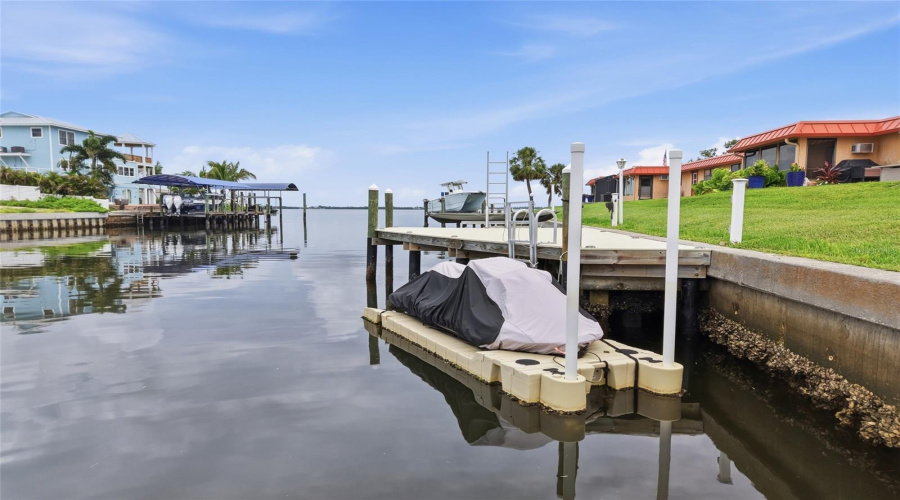 Private Dock With Floating Jet Ski Dock In Photo