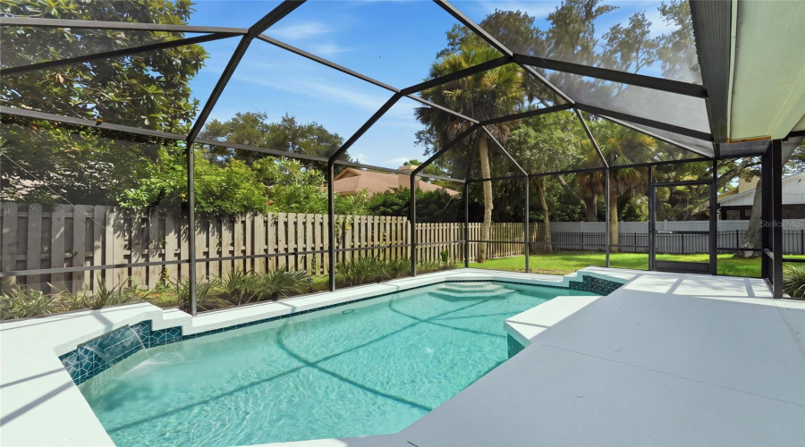Well Maintained Pool With Waterfall Feature