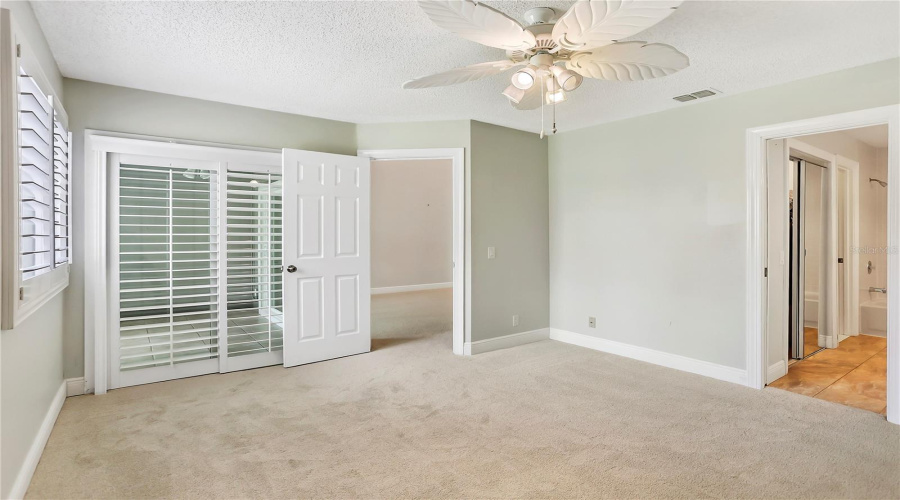 Private Sliding Doors To Back Porch.