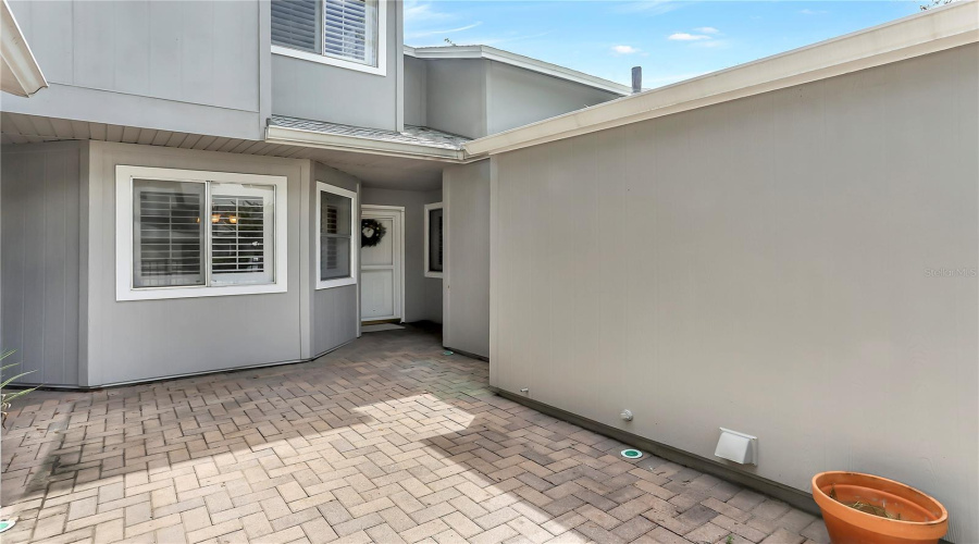 Gated, Paver Front Courtyard.