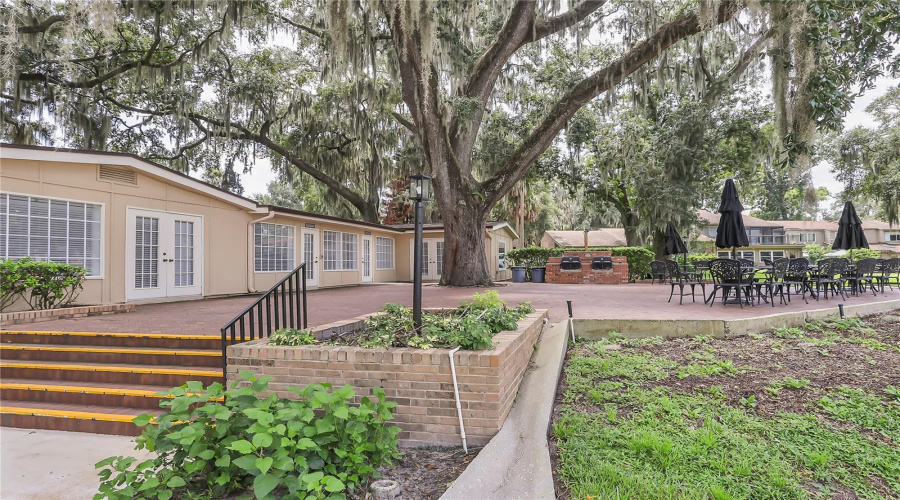 Spacious Patio At The Clubhouse With Bbq Grills And Overlooking The Pool.