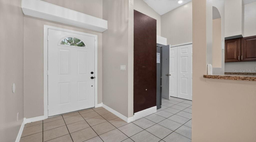 Welcoming Foyer With Soaring Ceilings And An Open Layout