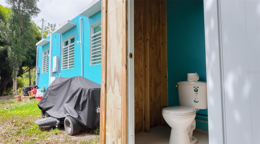 Half Bathroom In Backyard Of Primaru House