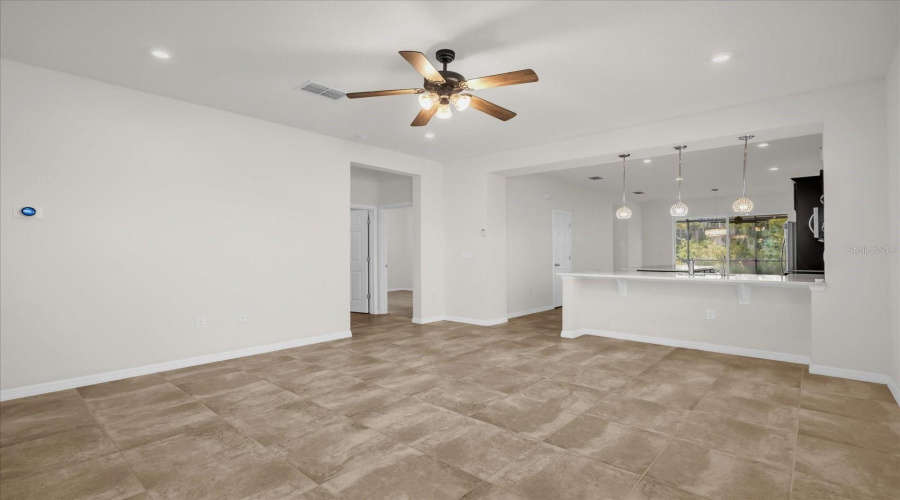 Living Room With View Of The Kitchen