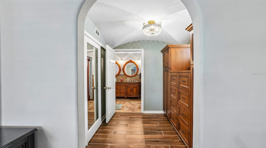 Large Closet And Dressing Area Entering Into The Primary Bathroom