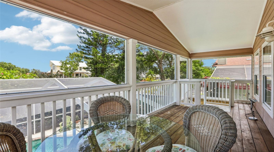 Second Floor Screened Patio And Stairs To The Pool Area