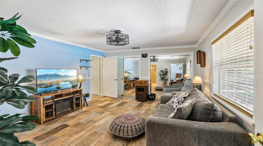 Inlaw Bedroom With Large Closet And Window To Screened Pool Area