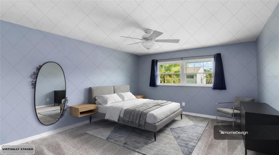 *Virtually Staged: Primary Suite Overlooking Courtyard