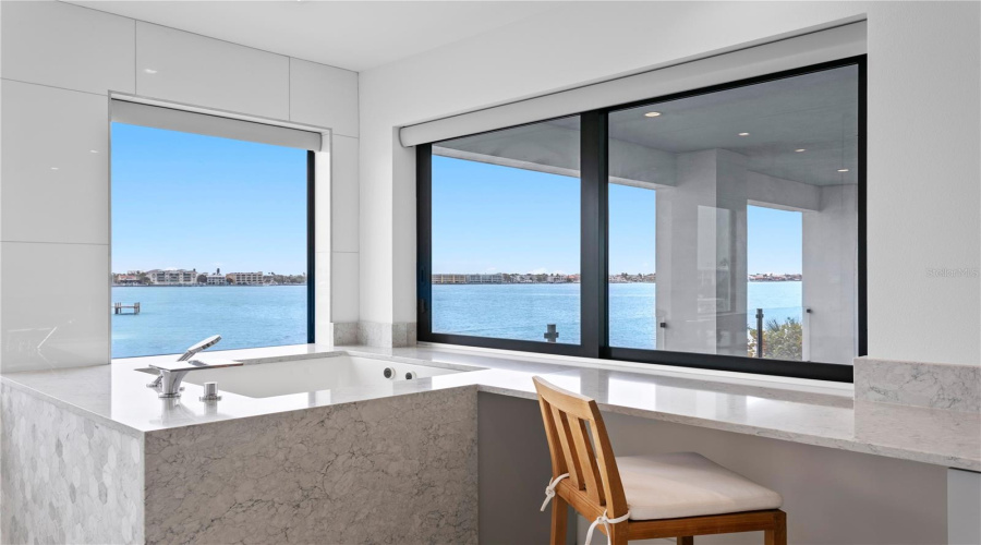 Open Water View From The Primary Bathroom And Soaking Tub With Jets