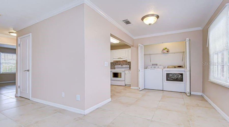 Convenient Laundry Closet With Washer And Dryer