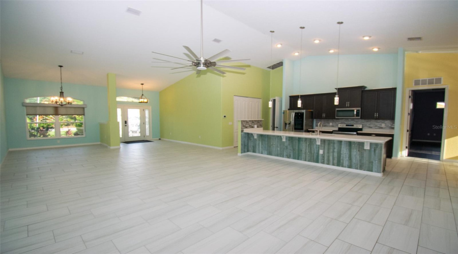 The Kitchen Overlooks The Family Living Room, So You Never Miss Any Of The Action.