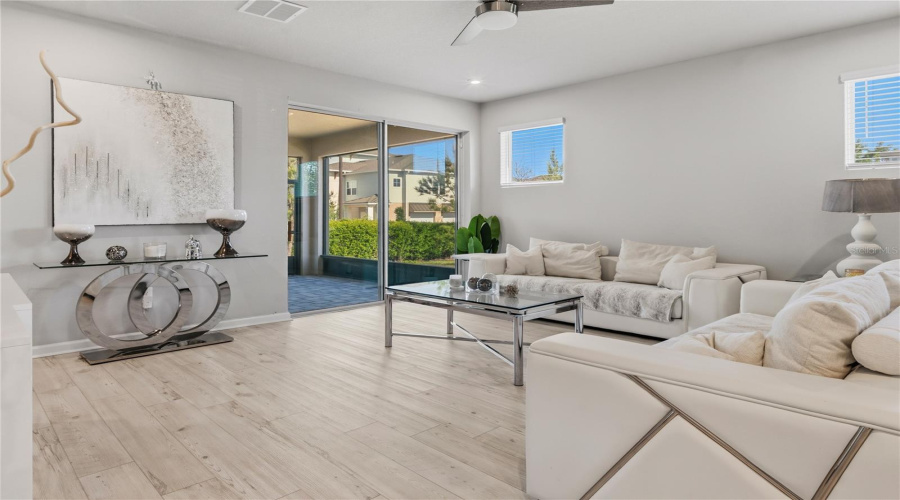 Living Room + Screened In Patio