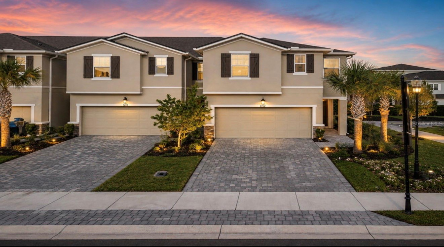 Front Of The Corner Lot Unit. Digitally Enhanced