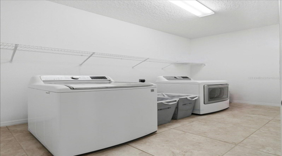 A Dedicated Laundry Room With Generous Storage Keeps Everyday Essentials Organized, Contained And Effortlessly Out Of Sight.