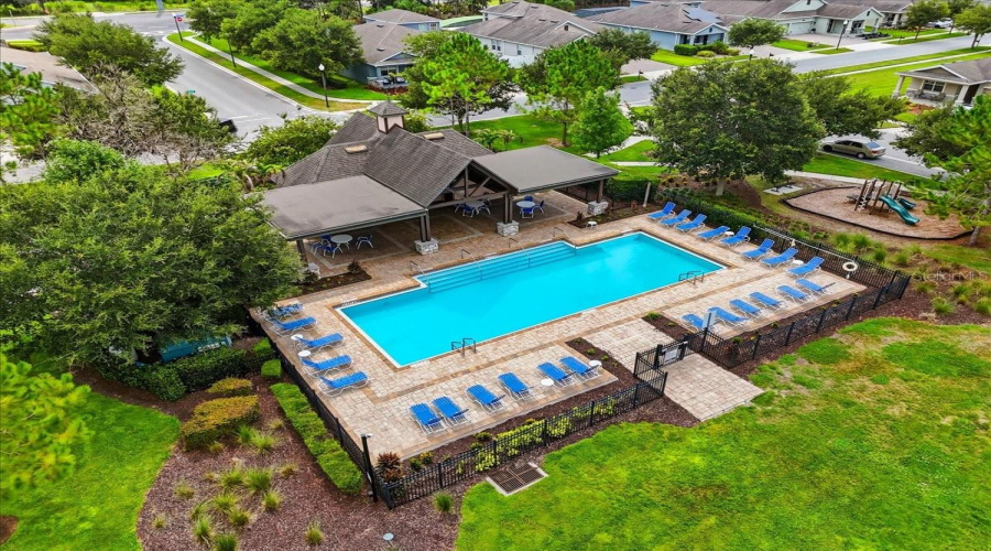 Resort-Style Living Is Right Outside Your Door, With A Sparkling Community Pool, Shaded Pavilion And Playground Designed For Easygoing Florida Days.