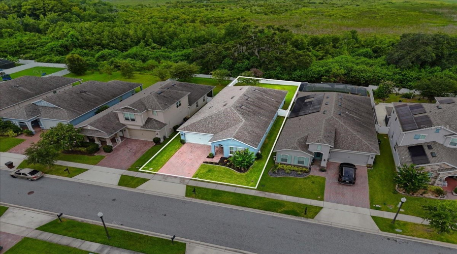 A Generously Sized, Fully Fenced Backyard Extends To Lush Conservation, Creating A Private Outdoor Retreat With No Rear Neighbors And Room To Truly Enjoy The Florida Lifestyle.