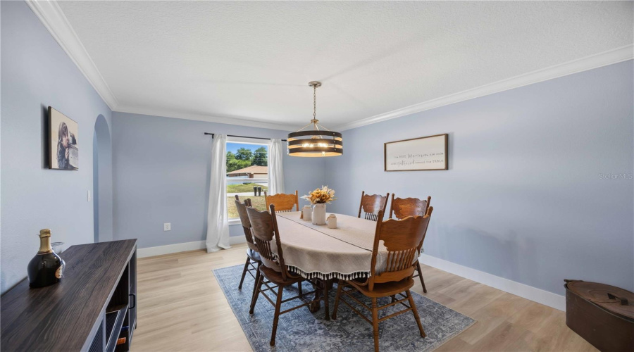 Large Bright Dining Room With Nice View Of The Front Yard