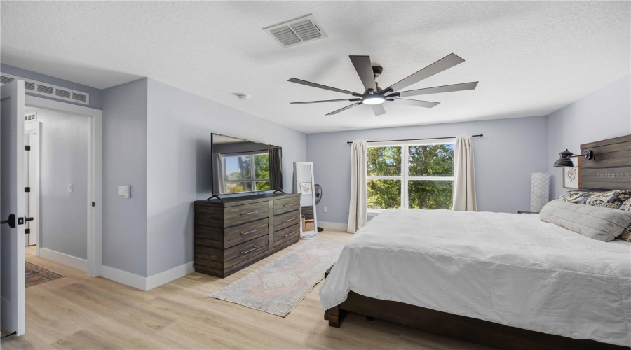 Bright And Open Primary Suite Filled With Natural Ligh