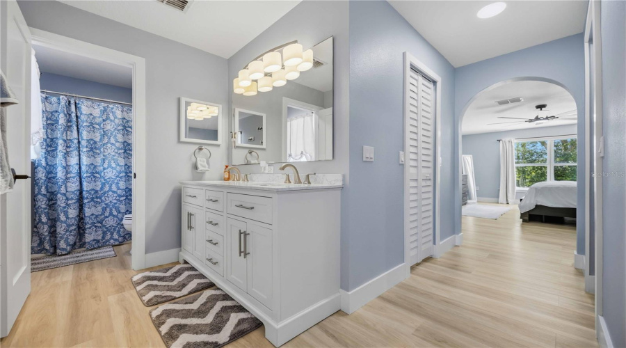 Primary Shower And Toilet In Separate Enclosed Space