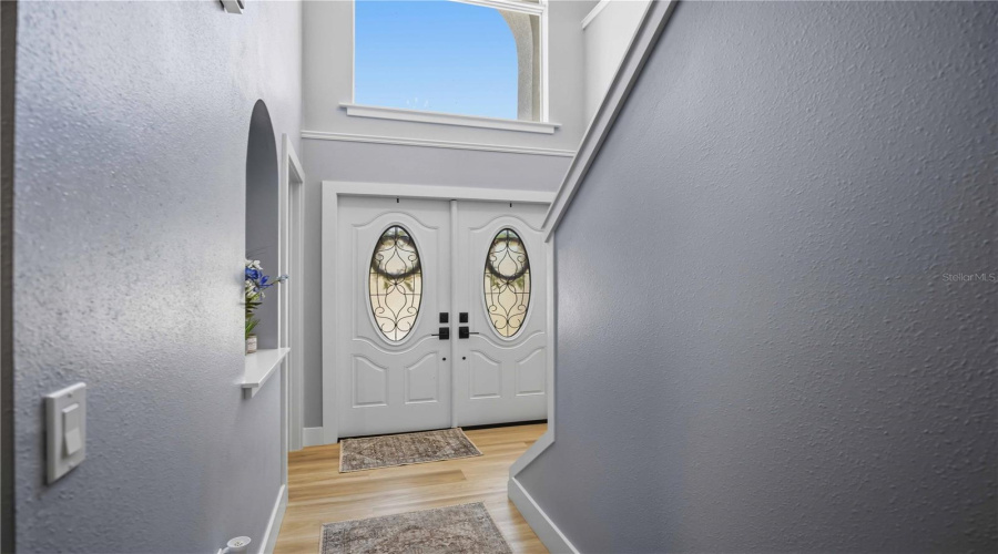 Entry View With Double Doors