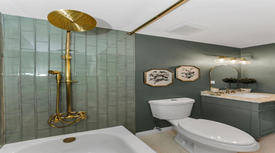 Gorgeous Sage Vanity With Quartz Countertops