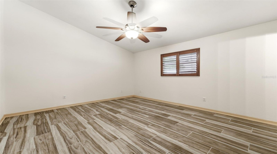 Bedroom Three With Comfortable Secondary Bedroom With Generous Natural Light.