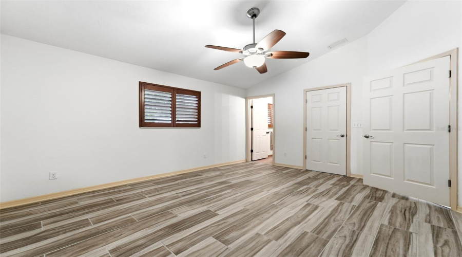 A Spacious Owner'S Suite Filled With Natural Light And Calming Finishes.