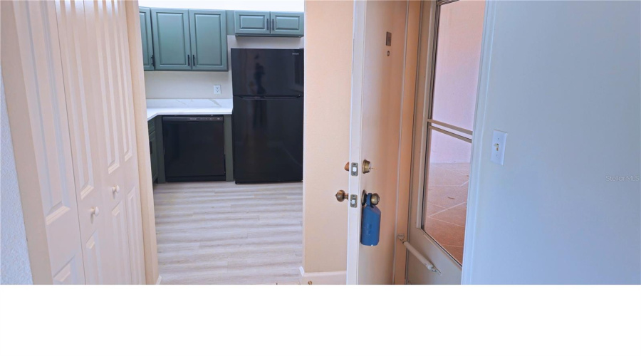 The Kitchen To The Right As You Enter From The Front Entrance. Spacious Double Door Closet For Extra Storage As You Enter.