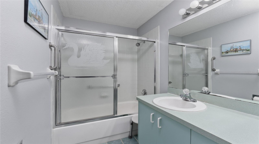 Second Full Bathroom Conveniently Located For Guests.