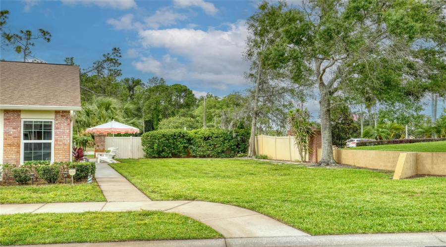 Additional Exterior View Highlighting The Desirable End-Unit Location.