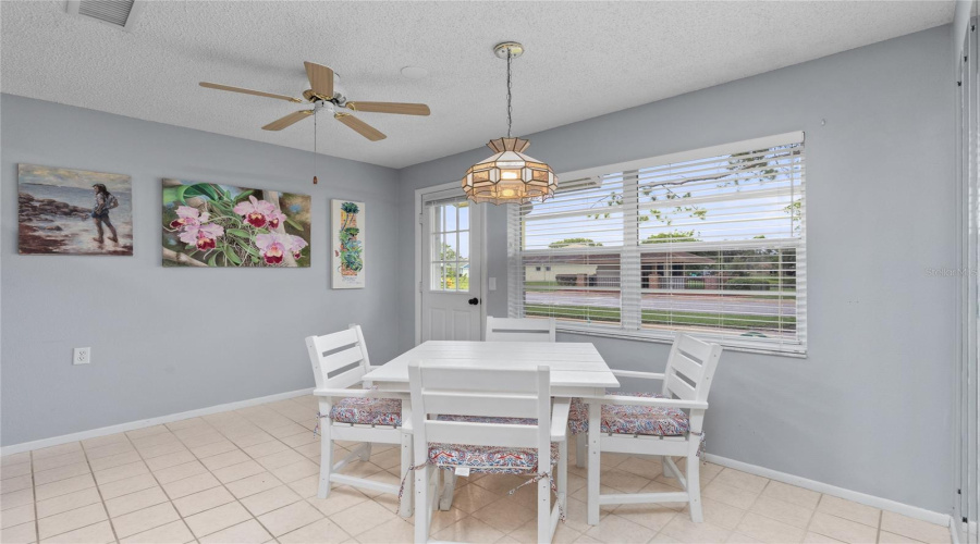 Bright Dining And Breakfast Area Conveniently Located Near The Kitchen.