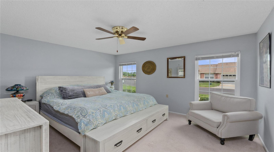 Spacious Primary Bedroom Offering Comfort, Natural Light And Privacy.