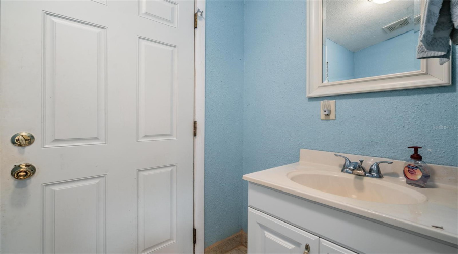 Half Bathroom Off Pool Area