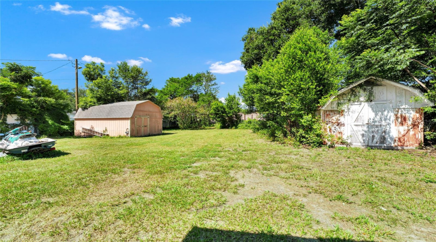 Backyard With Two Sheds