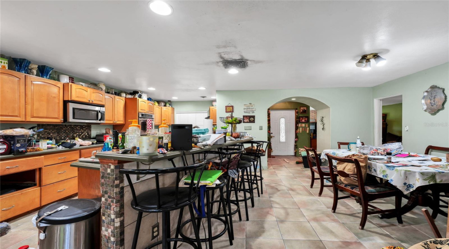 Kitchen, Island And Dining Area