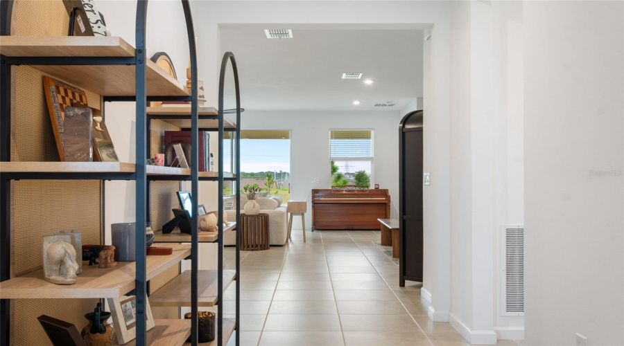 Walk Down The Main Foyer Hall To The Split Bedroom 4 To The Right In Its Own Hallway. This Floor Plan Is Truly A Split Floor Plan With Bedrooms 2 And 3 Together To The Left Of Front Door And Bedroom 4 On The Right Before Reaching The Great Room.