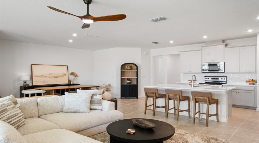 Seating Area Is Cozy But Intertwined With The Dining And Breakfast Area, The Chef Is A Part Of Everything In This Great Room Plan.