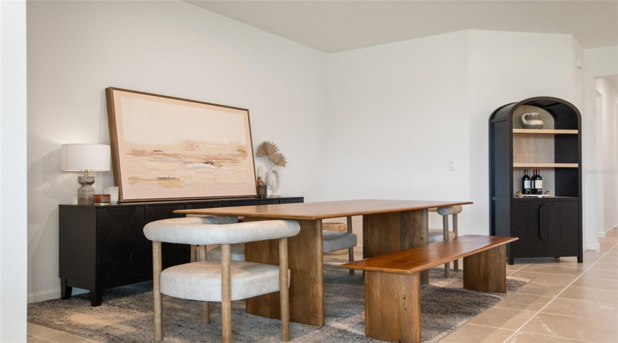 From The Dining Area To The Right Is The Foyer Hallway To Front Door And Supporting Bedrooms.