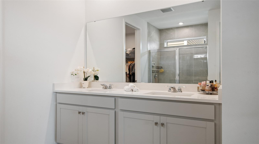 Plenty Of Storage And Double Sinks Allow Togetherness In Prepping For The Day.