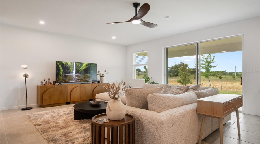 From The Great Room You Notice, No Rear Neighbors Peeking In Lots Of Privacy! Very Unusual For Home Sites In Waterbrooke. Very Limited No Rear Neighbor Lots. Lets Take A Look At The Covered Porch And View.