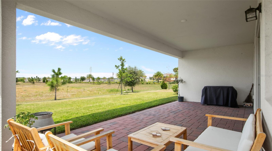Your Own Paradise Out The Rear Your View Is Unobstructed And The Papered Patio Is Upgraded And Warm. Room For A Grill, Seating And A Fire Pit If You Choose.