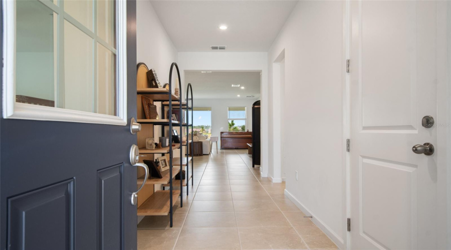 As You Enter The Garage Door Is Immediately To Your Right Allowing Easy Access On Rainy Days For Unloading Groceries Or Packages.