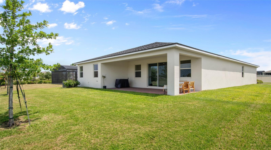 Revers View Of The Rear Of Home And The Spacious Covered Porch.