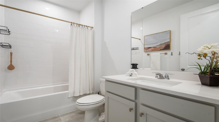 Bathroom 2 In Between Bedrooms 2 And 3 In The Front Hallway.