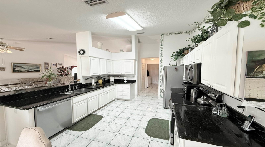 Kitchen With Granite Countertops &Amp; Stainless Steel Appliances
